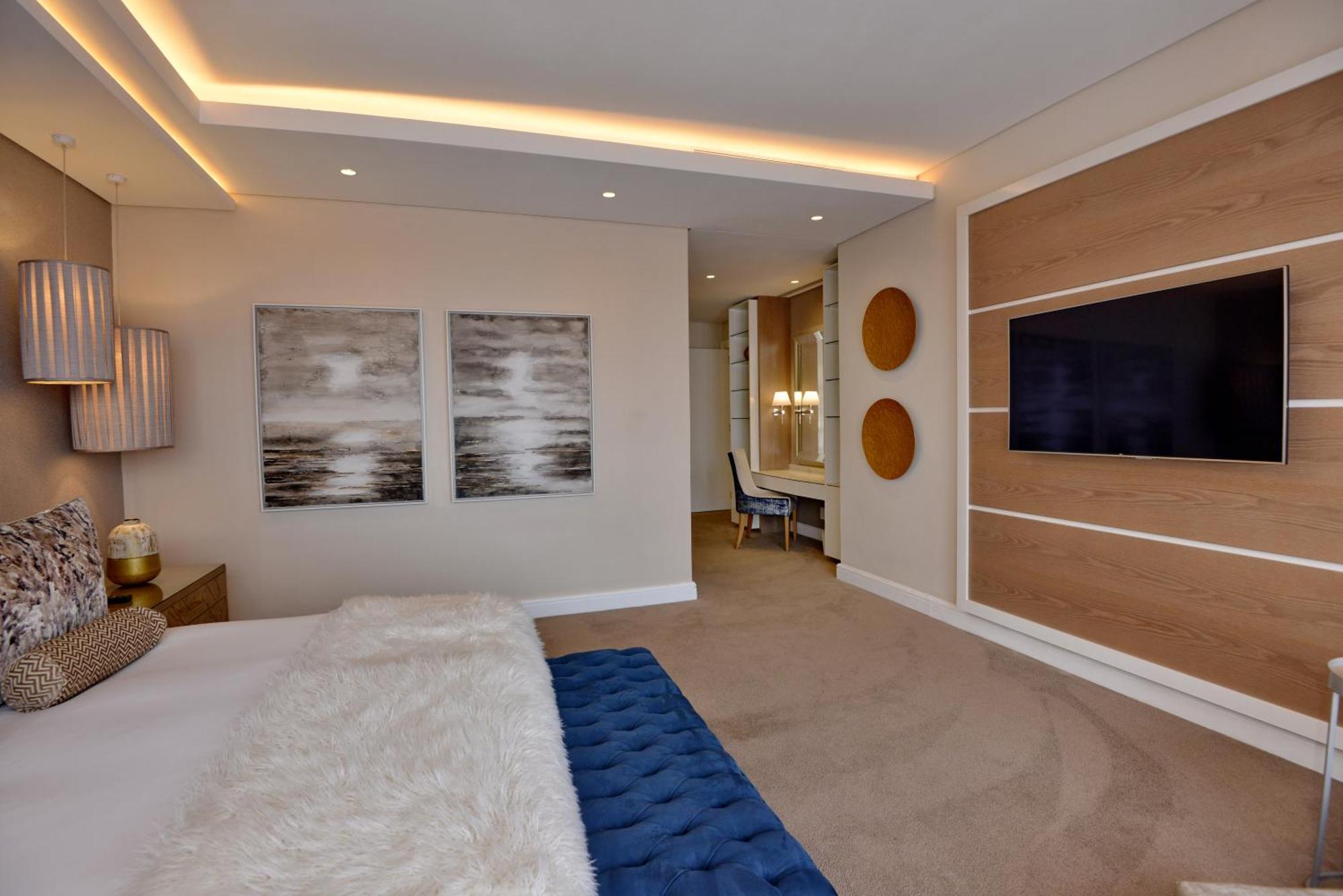 The Houghton Hotel, Spa, Wellness & Golf Joanesburgo Quarto foto A bedroom at The Ivy Collection