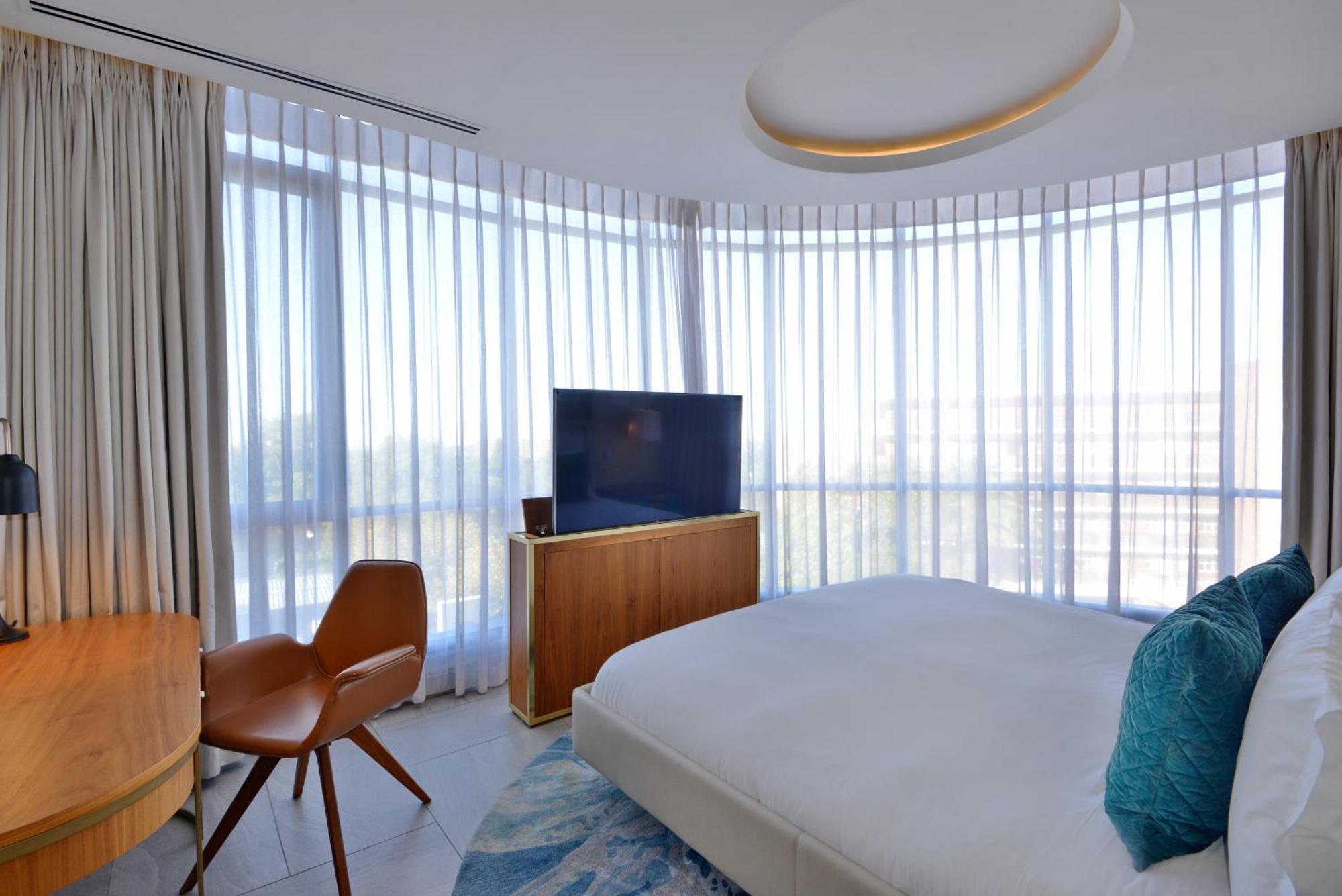 The Houghton Hotel, Spa, Wellness & Golf Joanesburgo Quarto foto A bedroom at the hotel